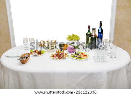 buffet table for fruit, sandwiches, fresh herbs, wine and champagne