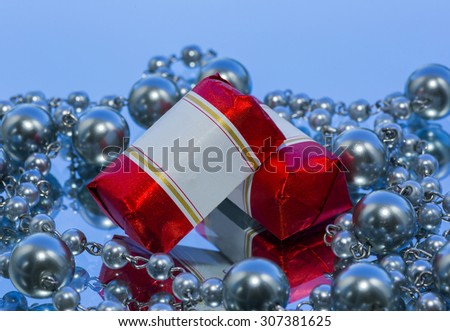 candy, jewelry, decorative glass lying on a mirror. fragment, still life, wallpaper
