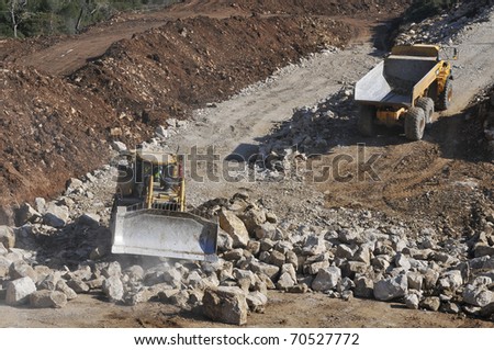 LEIRIA - FEBRUARY 3 : Machines work  on public work and construction of the expressway IC9  - Leiria in February 3, 2011 in Leiria in Portugal