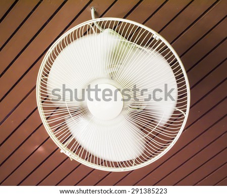 The ceiling fan spinning