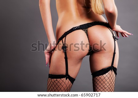 stock photo Closeup of perfect female rear in panties and stockings
