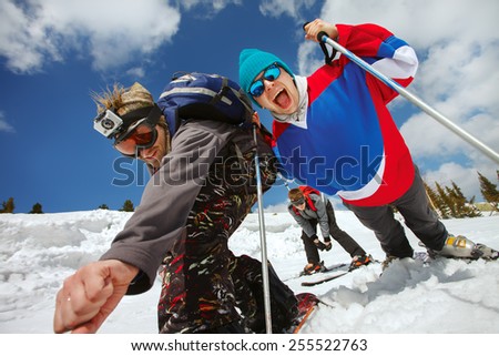 Young guys having fun at ski resort
