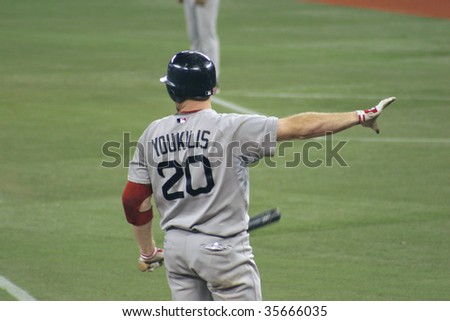 TORONTO - AUGUST 20: First Baseman Kevin Youkilis of Boston Red Sox gestures during a game against Toronto Blue Jays at the Rogers Centre on August 20, 2009 in Toronto