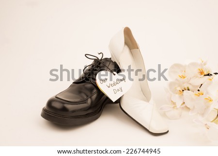 Bridge and groom shoes on the white background