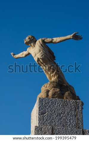Icarus statue trying to fly to the sun