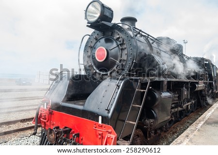 Classic old steam train in the station