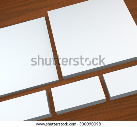 template to presentation. place for your design. many cards. stacks of paper. greeting cards. flyers. business cards. wood background.