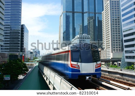 Sky train moving to alive in platform the mass transit go to central business aria of bangkok.
