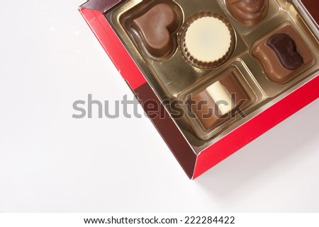 Box of chocolates on white background