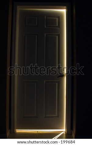 dark door with glow behind