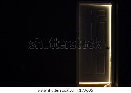 dark door with glow behind