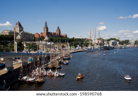 SZCZECIN, POLAND - JUNE 14, 2014: Sail Szczecin 2014.The tall masts of sailing ships fill the harbour for a wonderful three day event.It also has the sailing ship \