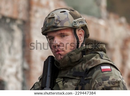 SZCZECIN, POLAND - MAY 31, 2014: Wounded Soldier in Polish Army uniform during  Historical reenactment