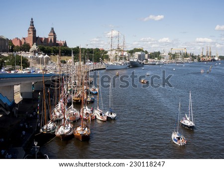 SZCZECIN, POLAND - JUNE 14, 2014: Sail Szczecin 2014.The tall masts of sailing ships fill the harbour for a wonderful three day event perfect for families and those who are sailors at heart.