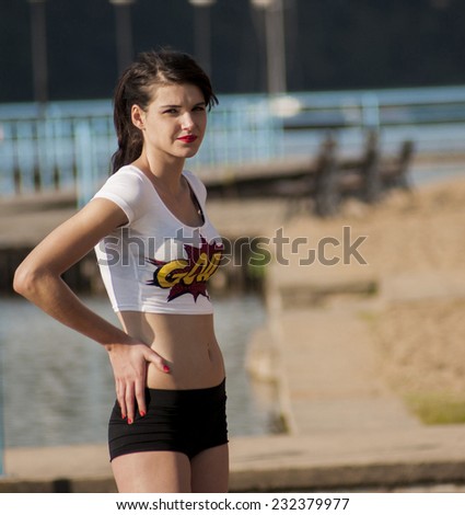 WAGRAWIEC, POLAND - JUNE 21, 2014: Attractive woman working during shooting music video clip of the polish Disco band Jurad