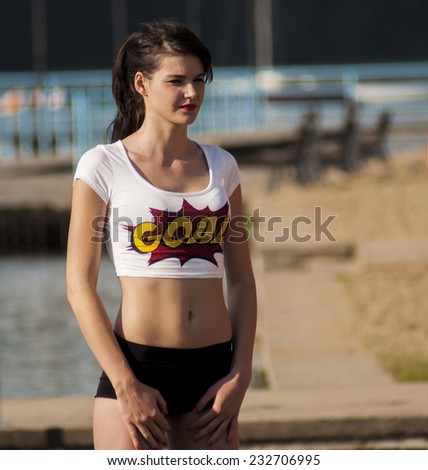WAGRAWIEC, POLAND - JUNE 21, 2014: Attractive woman working during shooting music video clip of the polish Disco band Jurad
