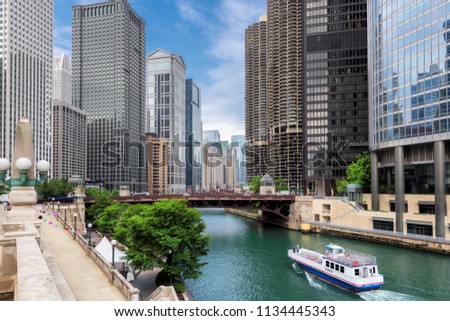 Chicago Skyline. Chicago downtown and Chicago River with bridges during sunny day.