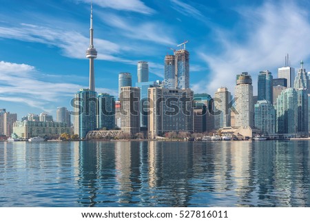 Toronto skyline with CN Tower with reflection in the lake. Canada.