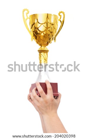 champion golden cup in hands