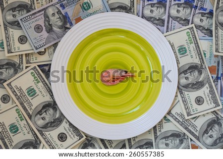 money, plate and shrimp