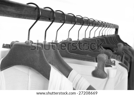 clothes on racks in store