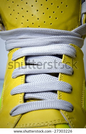 close-up laces on the yellow boots