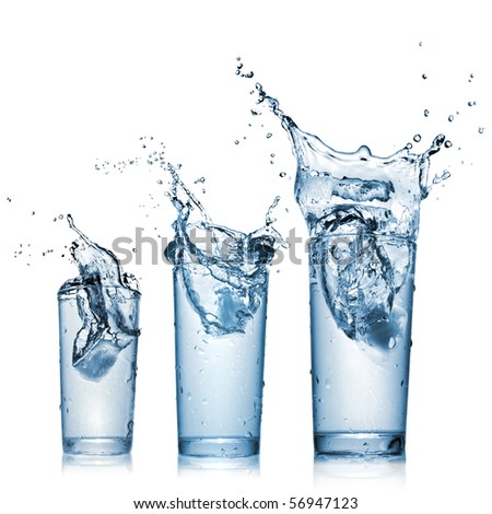 stock photo : water splash in glasses isolated on white