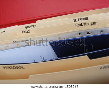 Folding file system with categories illustrating some of the elements of a busy life