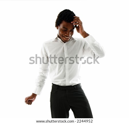 Young black male laughing at a funny moment.