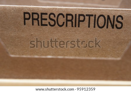 Filing system tab with the word prescriptions