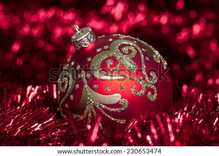 Amazing Christmas ball with rich golden ornament  on glossy background.  New Year's Day decoration, Christmas greeting card, wallpaper.