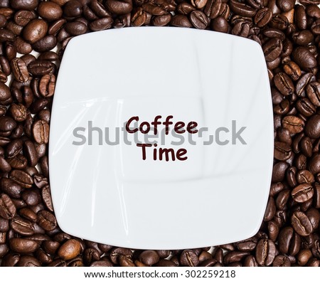 Coffee  background, grains of coffee plant and  white saucer. \
