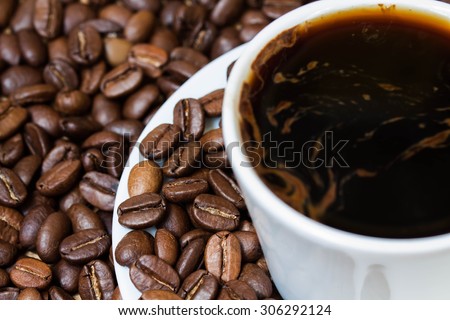 Coffee  wallpaper, background, grains of coffee plant and black coffee drink in white coffee set. Coffee time texture