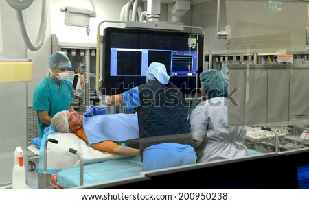 Surgical team operating on patient in hospital Sofia, Bulgaria March 11, 2014