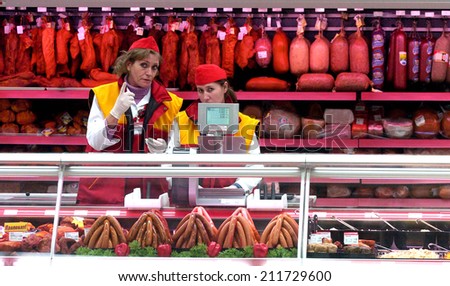 Sellers at the meat counter in a supermarket in Sofia, Bulgaria Dec 13, 2006