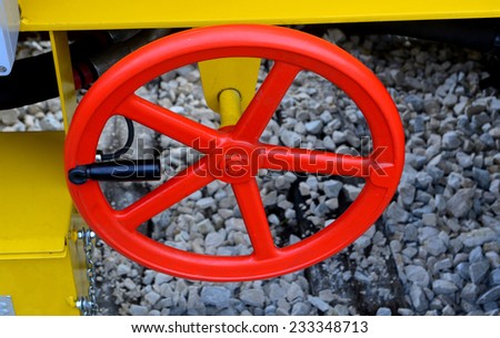 Yellow railway repair machine closeup