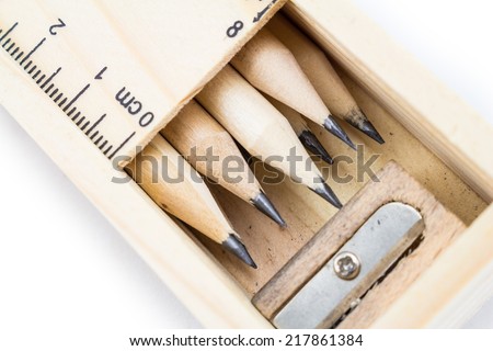 Wooden pencil box,Inside the box is a lot of pencils and sharpener