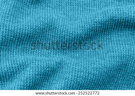 Blue fabric as the background.