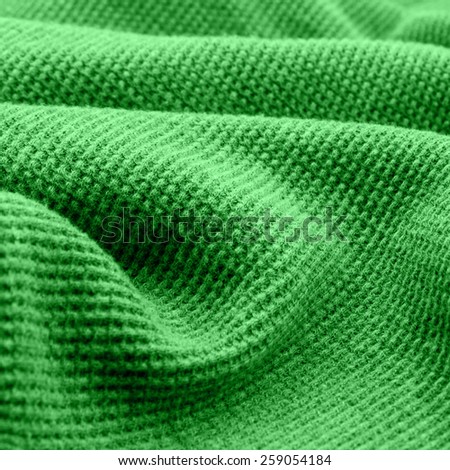 Green fabric as the background.