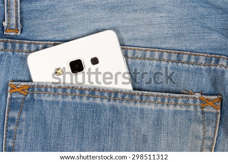 white mobile phone in pocket with black screen.
