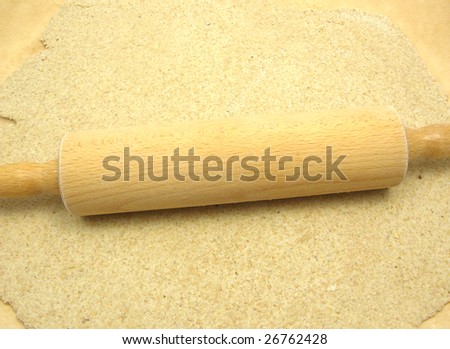 Rolled out  wholemeal dough with a rolling pin