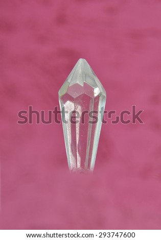 Glass crystal on red