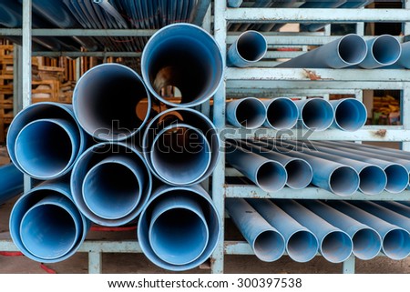Dusty blue pipe pvc in stock shelf
