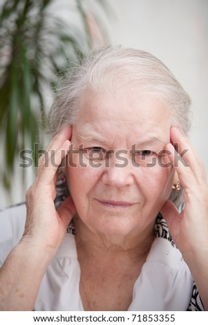 Senior woman with headache pain