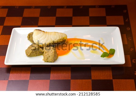 Sea bass fish fillet on bar background