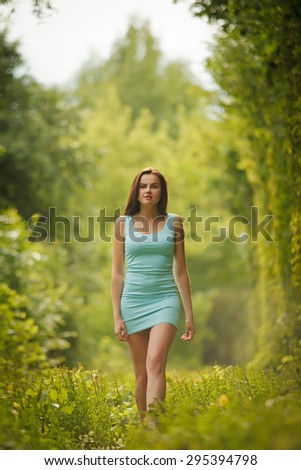 Beautiful girl walking through tunnel of love in Ukraine_ver