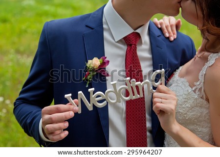 Wedding couple holding wedding plate