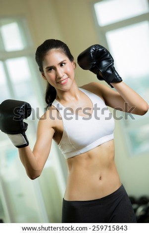 Woman with boxing gym