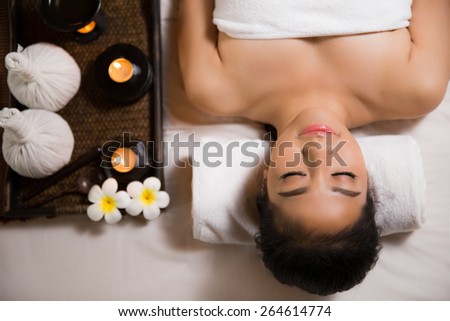 woman having massage and spa salon Beauty treatment concept, She is very happy,top view
