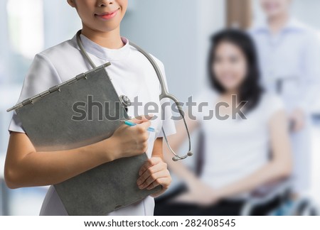 Asian nurse holding a steel file. To save the patient\'s situation